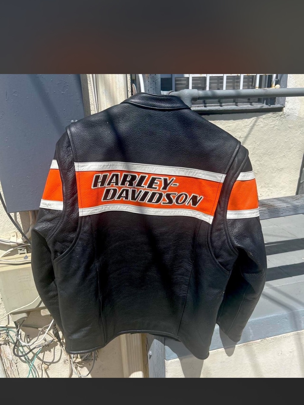 Harley-Davidson Men’s Black Leather Jacket with Orange Stripe